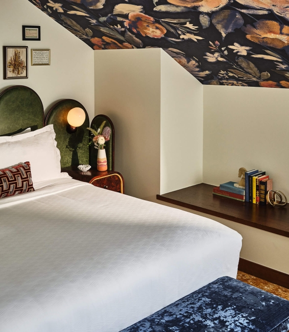 King bed in the Premium Loft Guest Room at the Crawford Hotel in Denver, Colorado.