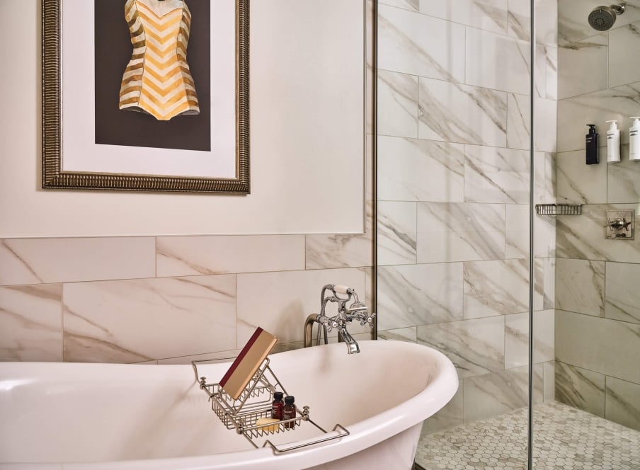 The bathroom of the Premium Classic Guest Room at the Crawford Hotel in Denver, Colorado.