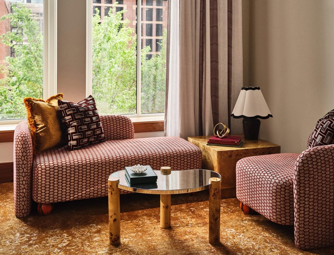 The seating area of the Premium Classic Guest Room at the Crawford Hotel in Denver, Colorado.