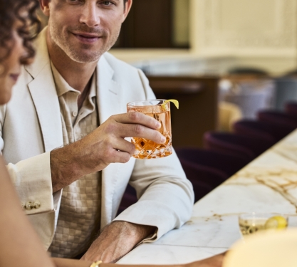 a man staring at a woman