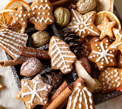 Overhead view of a box full of festive cookies