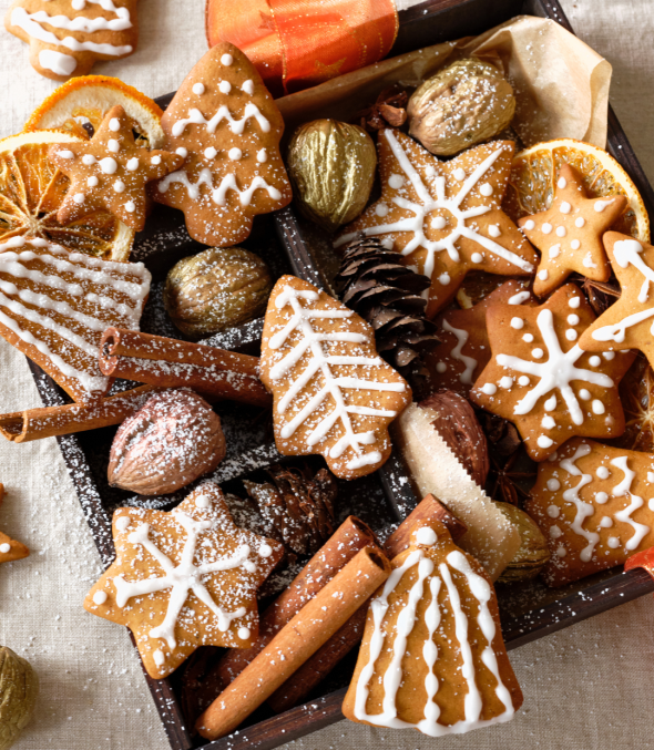Overhead view of a box full of festive cookies