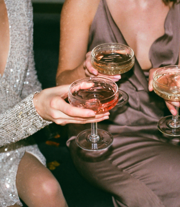 Close up of women enjoying drinks