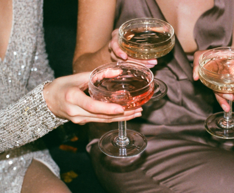 Close up of women enjoying drinks
