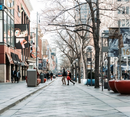 Side walk with people walking in denver