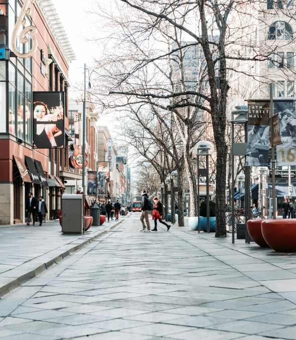 Side walk with people walking in denver
