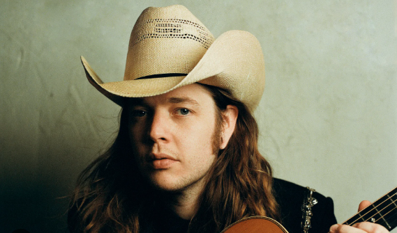 close up of billy strings
