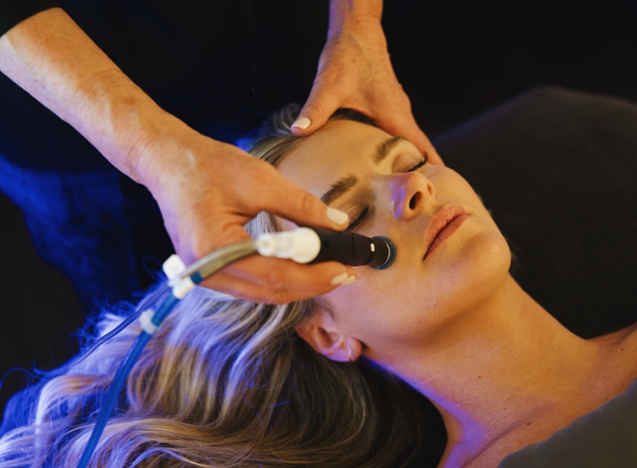 A woman getting a wellness treatment