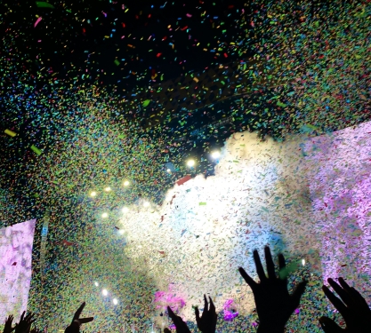 Concert Crowd with Lights and Confetti
