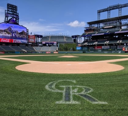Interior of a baseball stadium with CR on the grass